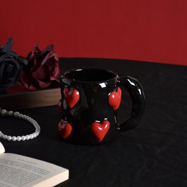 O1CN01Ge5puF1wWmWIBCH7f__2216996826316-0-cib Instagram-worthy sophisticated black heart-shaped ceramic mugs Home use couple's matching set Ceramic coffee mugs Perfect as a thoughtful gift